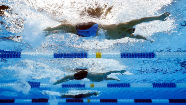 ELITE SWIMMERS PUSH LIMITS, TRAIN MORE AGGRESSIVELY WITH HAMMER HEAD SWIM CAPS