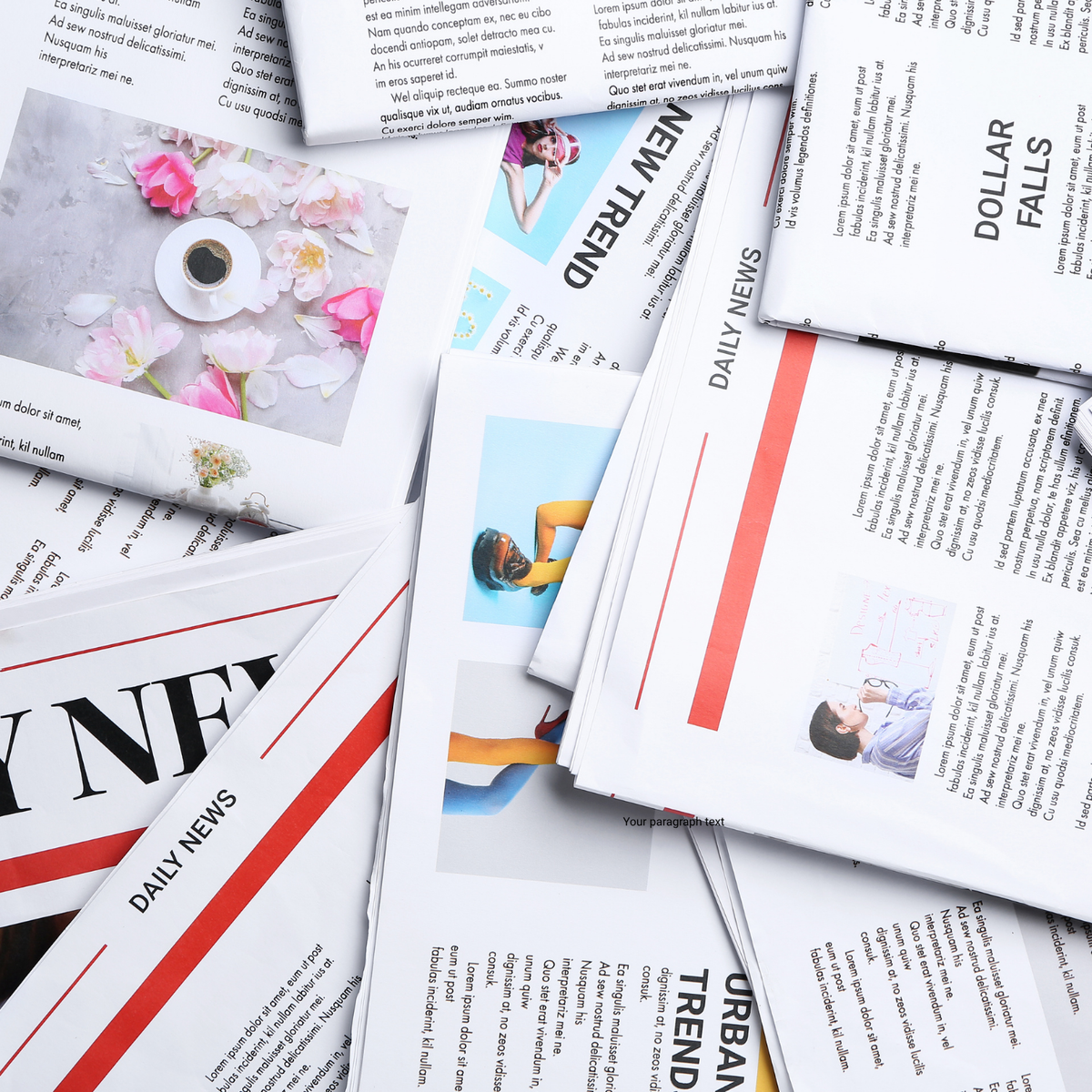 Stack of newspapers with various articles and images on a white background.