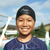 This athletic asian teenager wears the black Hammer Head Swim Caps - Safe and Fast Swim Cap for Adults and Youth, 50% Safer and 10.5% Faster than Standard Swim Caps, Durable with 365-Day Guarantee, Approved by Olympians, Parents, Triathletes, and Coaches. Hammerhead swim caps is a waterproof swim cap, qualifies for custom swim caps with three size options and delivers protective swim caps.